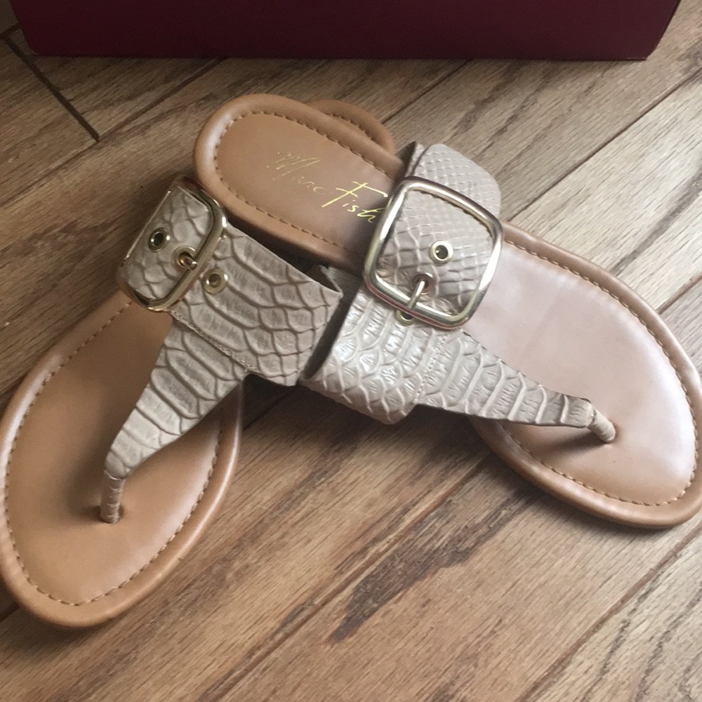 Gently used bone colored Marc Fisher sandals